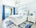 Master bedroom with king size bed and balcony access to ocean views